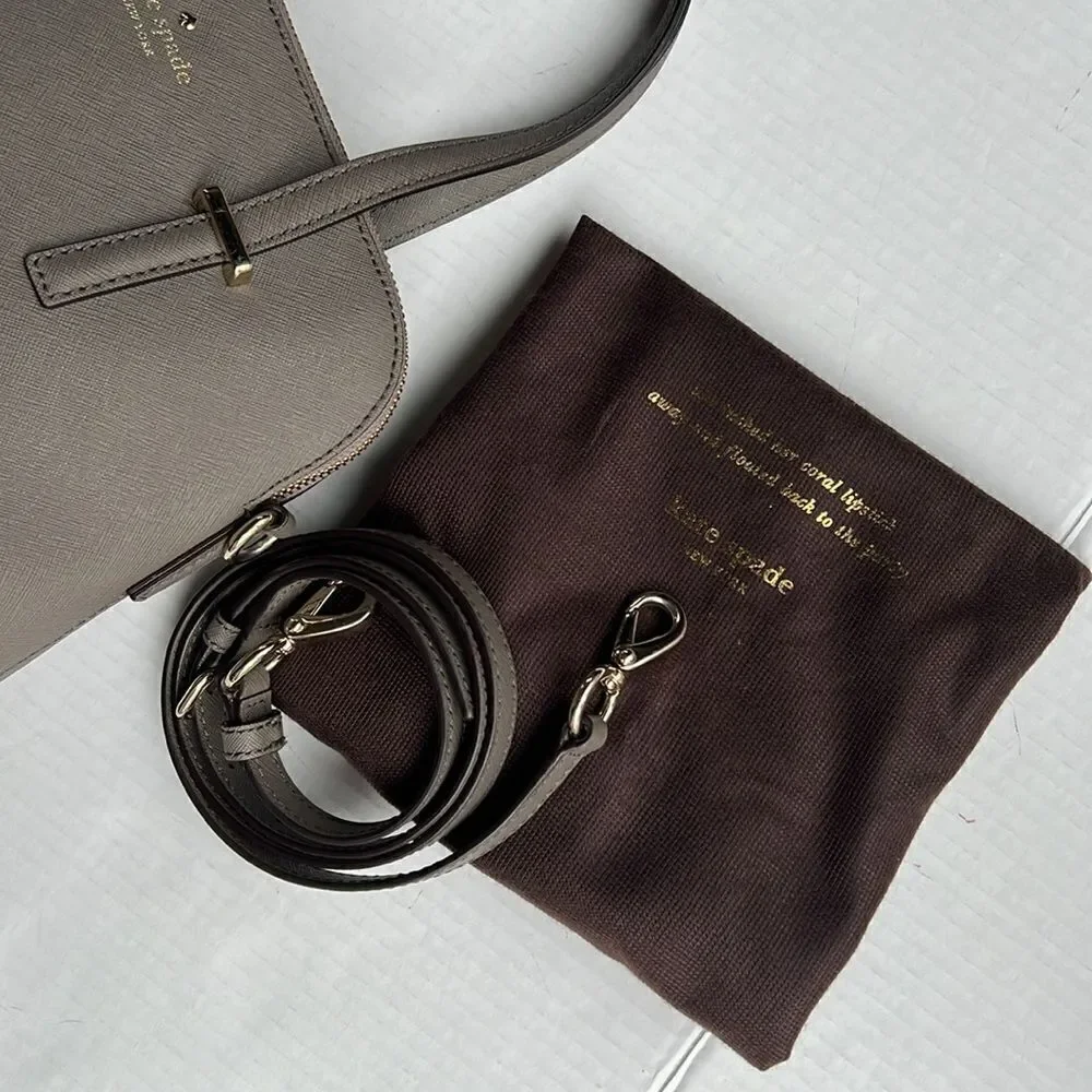 Kate Spade Cedar Street Maise Satchel in a shade of grey or taupe.